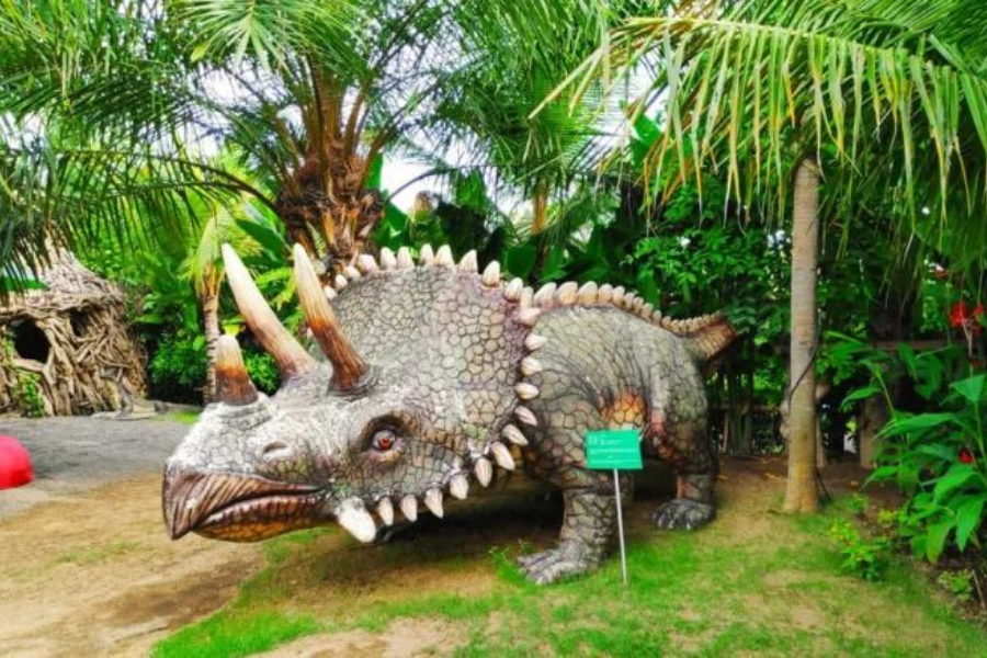 The combination of nature and sturdy art sculptures in big garden corner sanur bali