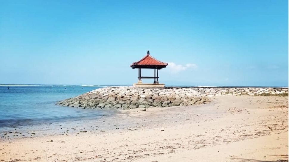 enjoying sunrise at sanur beach bali